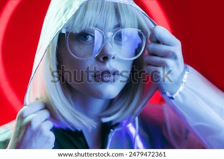 Similar – Young blonde woman asking for silence