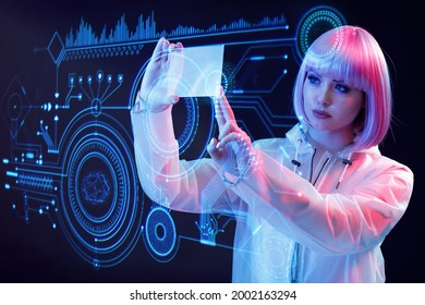 Woman with futuristic tablet in hand. Girl in glasses of virtual reality presses the start button. Augmented reality game, future technology, AI concept. Holographic interface to display data.