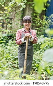 Woman Garden Leaning On Shovel Stock Photo 198548795 | Shutterstock