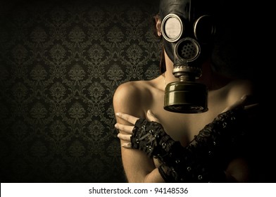 Woman with gas mask in a grunge background - Powered by Shutterstock