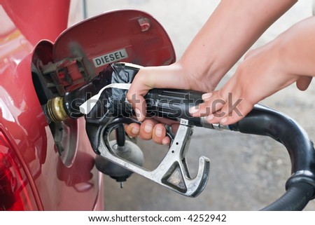 woman at gas station