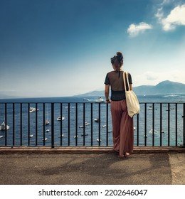 Woman gazing upon the horizon far away closeup