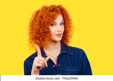 Woman Gesturing A No Sign. Closeup Portrait Unhappy, Serious Redhead Curly Hair Girl Raising Finger Up Saying Oh No You Did Not Do That Yellow Background. Negative Emotions Facial Expressions Feelings