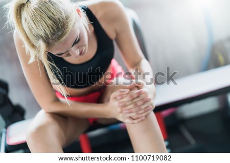 woman get accident between workout in gym body pain and hurt with wrong posture  exercise