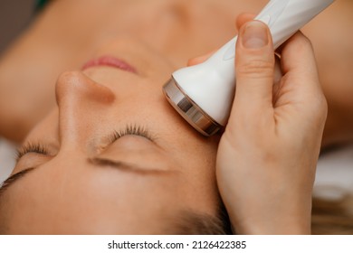 Woman Get Facial Hydro Microderm Abrasion Peeling Treatment Therapy. Cosmetic Beauty Spa Salon. Hydra Vacuum Cleaner