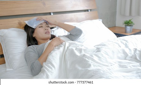 Woman Get Sick And Fever Lying On The Bed