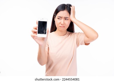 Woman get upset holding Broken screen of mobile phone Broken screen of smart phone with numerous crack Broken glass screen smartphone in hands of upset girl isolated on white background