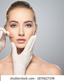 Woman getting cosmetic injection of botox near lips, closeup. Woman in beauty salon. plastic surgery clinic. - Shutterstock ID 1870627198