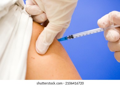 Woman getting the Covid19 vaccine dose.
