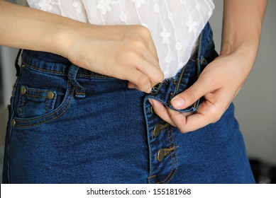 Woman Getting Dressed Wearing Jeans