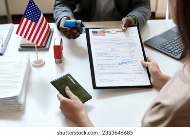 Woman getting her international documents - Powered by Shutterstock