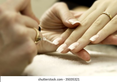 Woman Getting Manicure