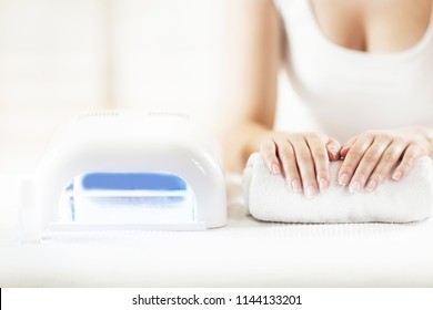 Woman Getting Nails Done