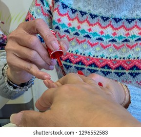 Woman Getting Nails Done