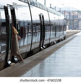 Woman Getting On A Train