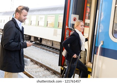 Woman Getting On Train Man Texting Phone Commuters Journey Stairs