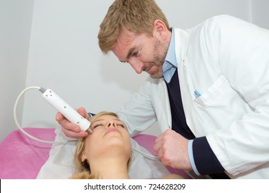 Woman Getting Ultrasound Skin Cleaning