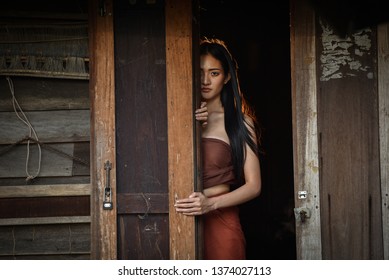 Woman Ghost Drama Standing On Old Door In Wooden Thai House / Horror Legend Of Mae Nak Phra Khanong