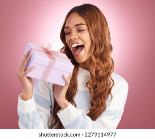 Woman  gift   box in studio for thinking  happiness   surprise celebration by gradient background  Student girl  young   happy and present package  excited face   celebrate birthday and wow