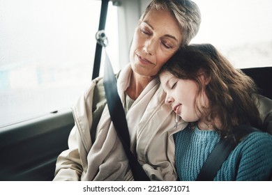 Woman And Girl In Car Sleeping During Road Trip, Journey Or Drive For Travel, Vacation Or Holiday. Grandmother, Child And Sleep In Van, Vehicle Or Transportation For Rest Together As Family