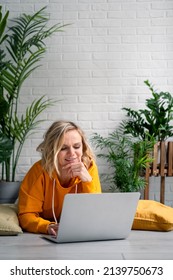 Woman Girl Using Computer Laptop Working Office Work Remotely From Home. Urban Jungle Home Plants. Distance Learning Online Education And Work. 