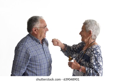 A Woman Giving Her Partner Medication