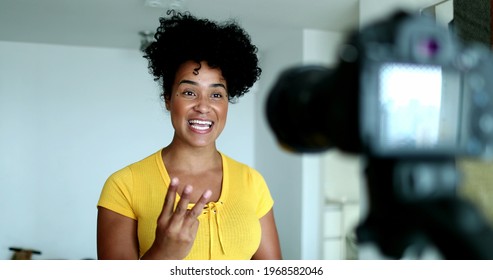 Woman giving testimony in front of camera doing explainer video