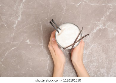 Woman With Glass Of Delicious Milk Shake At Table, Top View