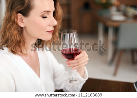 Woman with glass of delicious wine indoors Zdjęcia stock © 