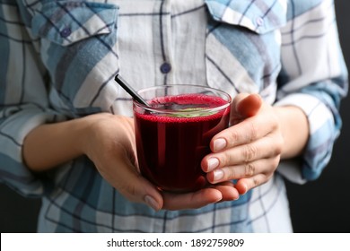 Woman With Glass Of Fresh Beet Juice, Closeup