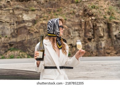 Woman With A Glass Of Wine Is Waiting For A Sober Driver. Designated Driver Service