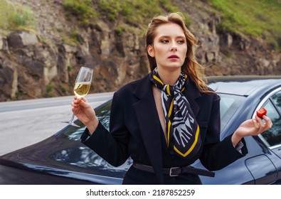 Woman With A Glass Of Wine Is Waiting For A Sober Driver. Designated Driver Service