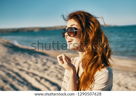 Woman in glasses and the sea                       