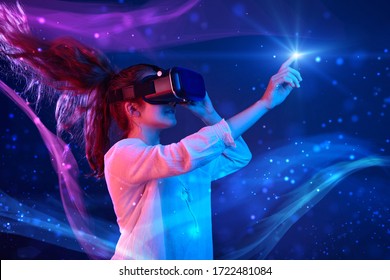 Woman with glasses of virtual reality. Future technology concept. Colorful neon lights. - Shutterstock ID 1722481084