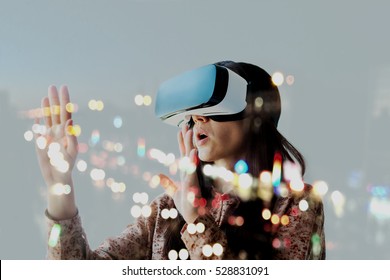 Woman with glasses of virtual reality. Future technology concept. - Shutterstock ID 528831091