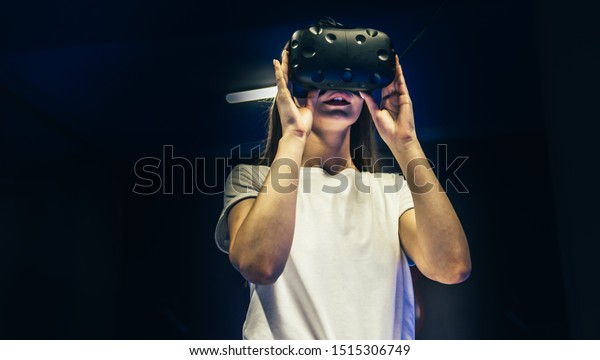 Woman with glasses of virtual reality. Future\
technology concept.