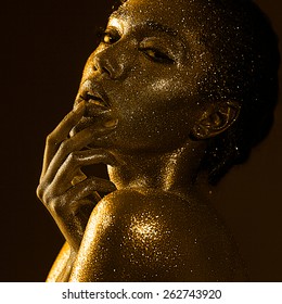 woman with glitter and spangle (shallow DOF)