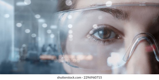 Woman in goggles in production on a blurred background. - Powered by Shutterstock