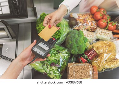 Woman Going To Make Payment In Supermarket