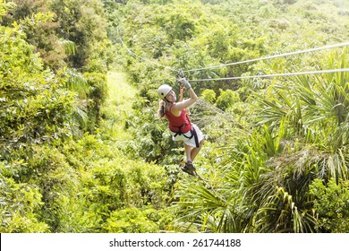 Woman Going On A Jungle Zipline Adventure