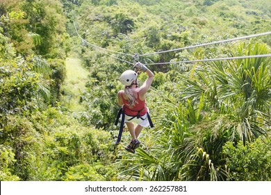 Woman Going On A Jungle Zipline Adventure 