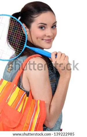 Woman going to play badminton