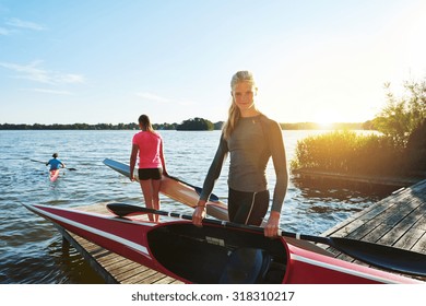 Woman in good shape with a kayak - Powered by Shutterstock