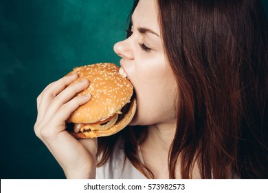 The Woman Greedy Eats Burger..