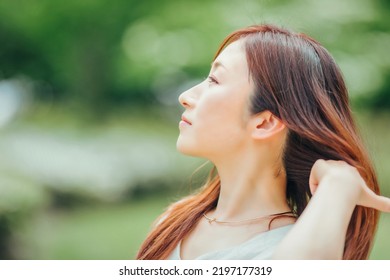 Woman In Green (hair Care)