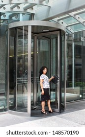 Woman Greeter Welcomes People Into A Hotel