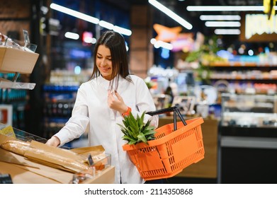 Woman Grocery Shopping And Looking Very Happy