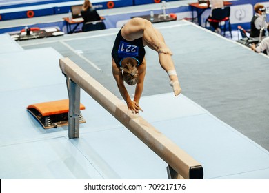 Woman Gymnast Acrobatic Skill In Balance Beam Gymnastics