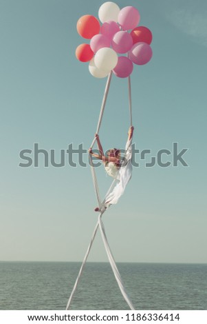 Similar – Young teenage girl blowing pink bubble gum