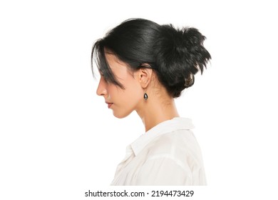 woman with hair clip on white studio background